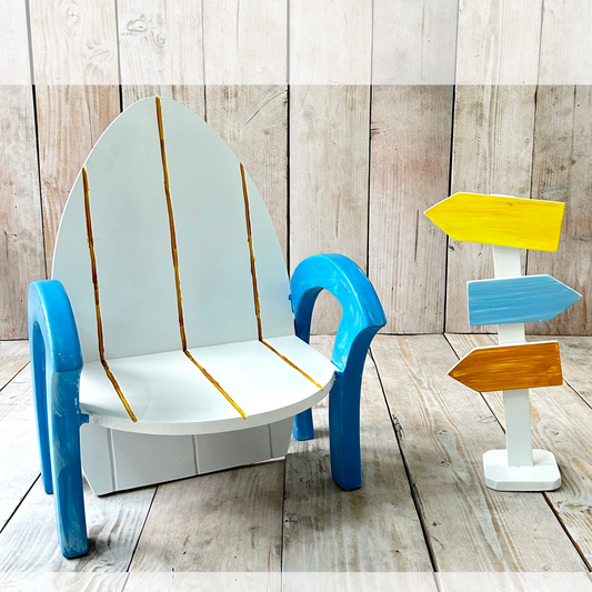 Beach Chair with arrow signage board