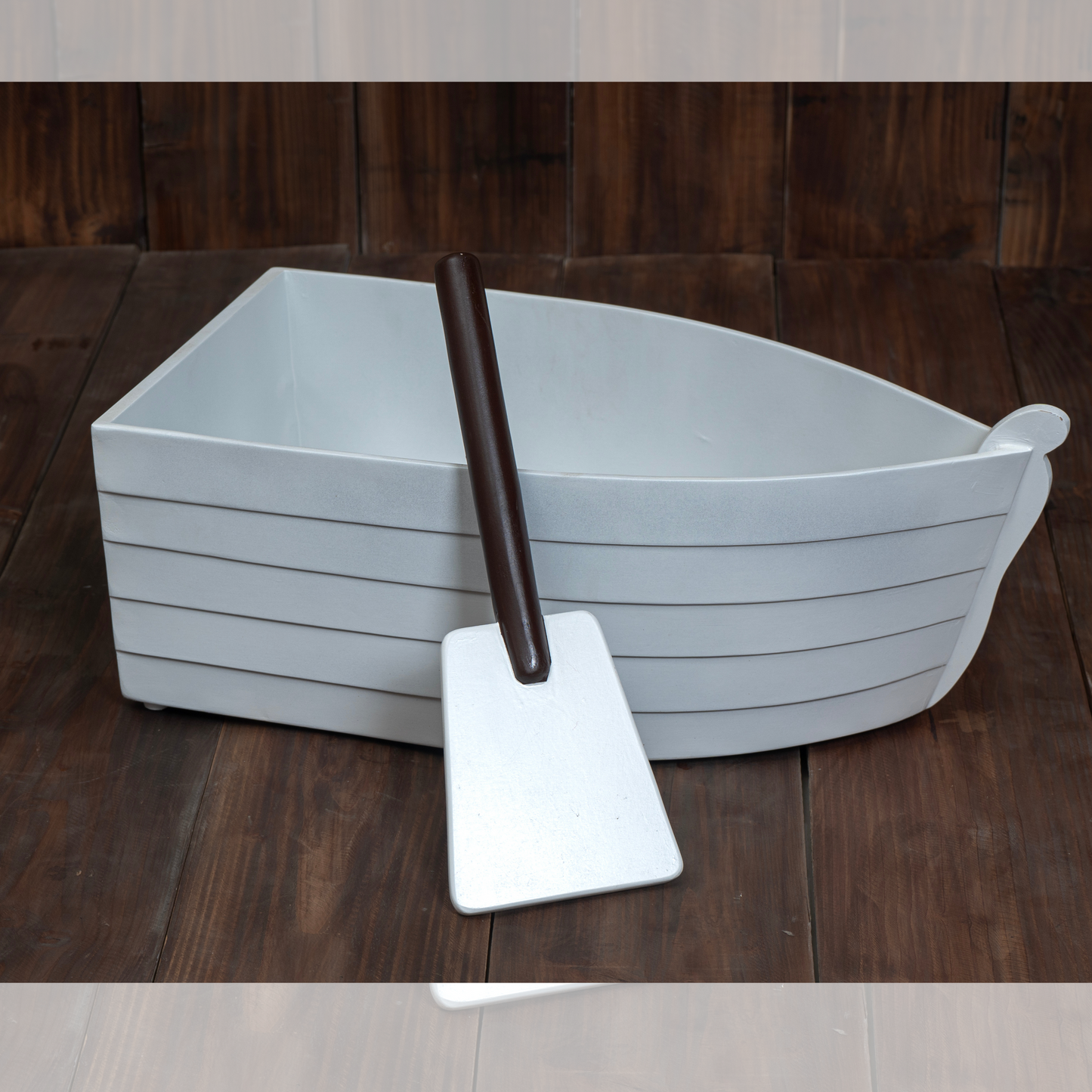Boat with paddle